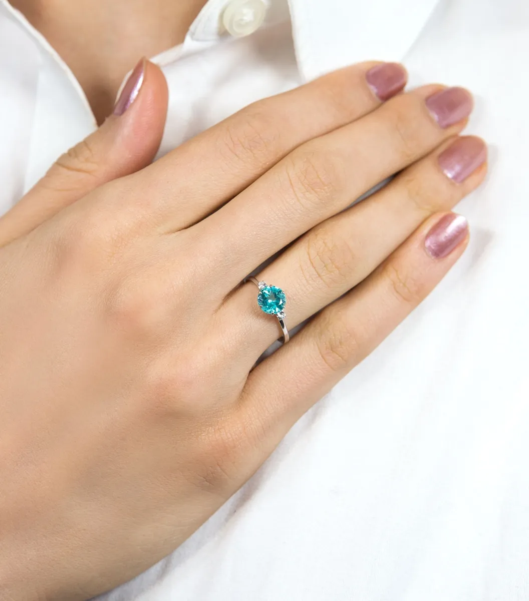 Anel de Ouro branco 18k aro com gema redonda apatita e topázio branco