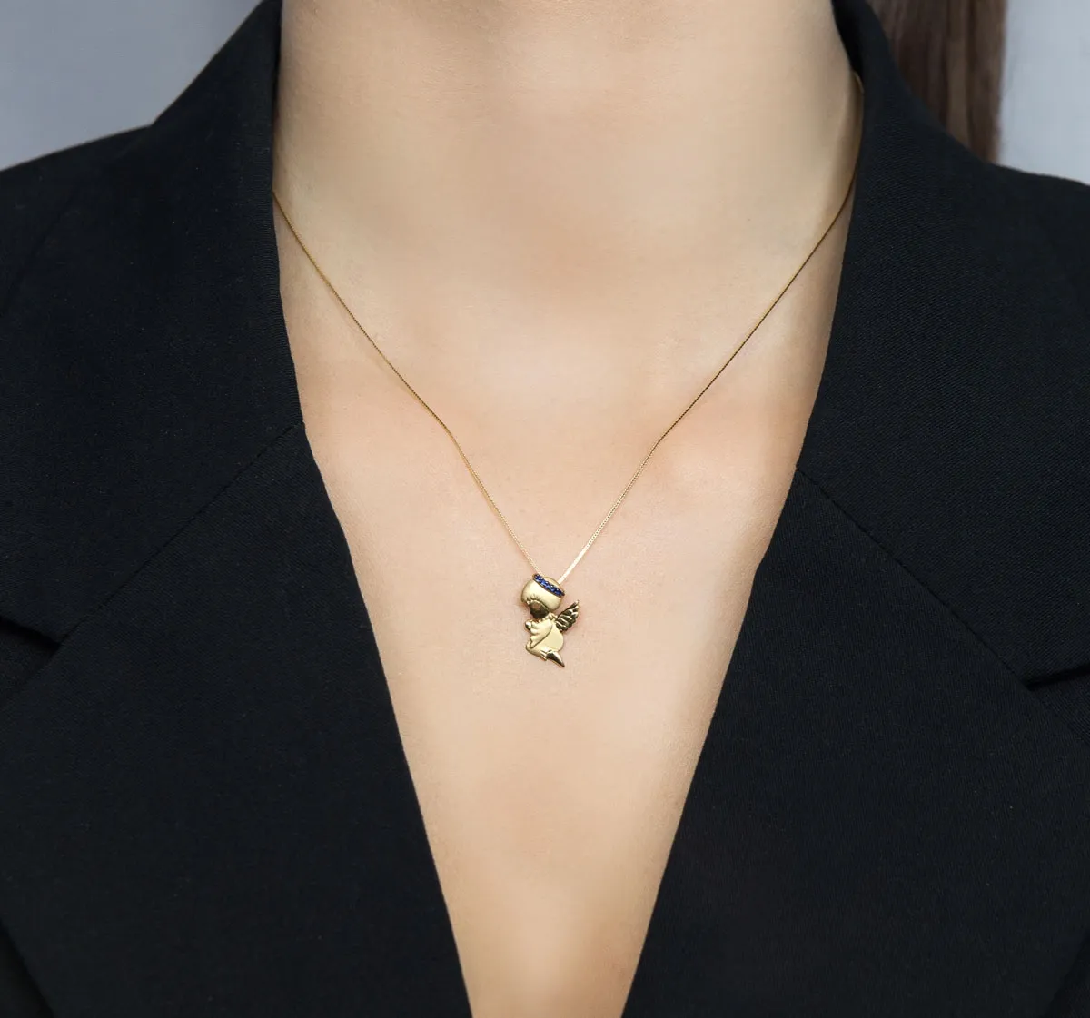 Pingente de Ouro 18k anjo da guarda com 3pts de safira azul