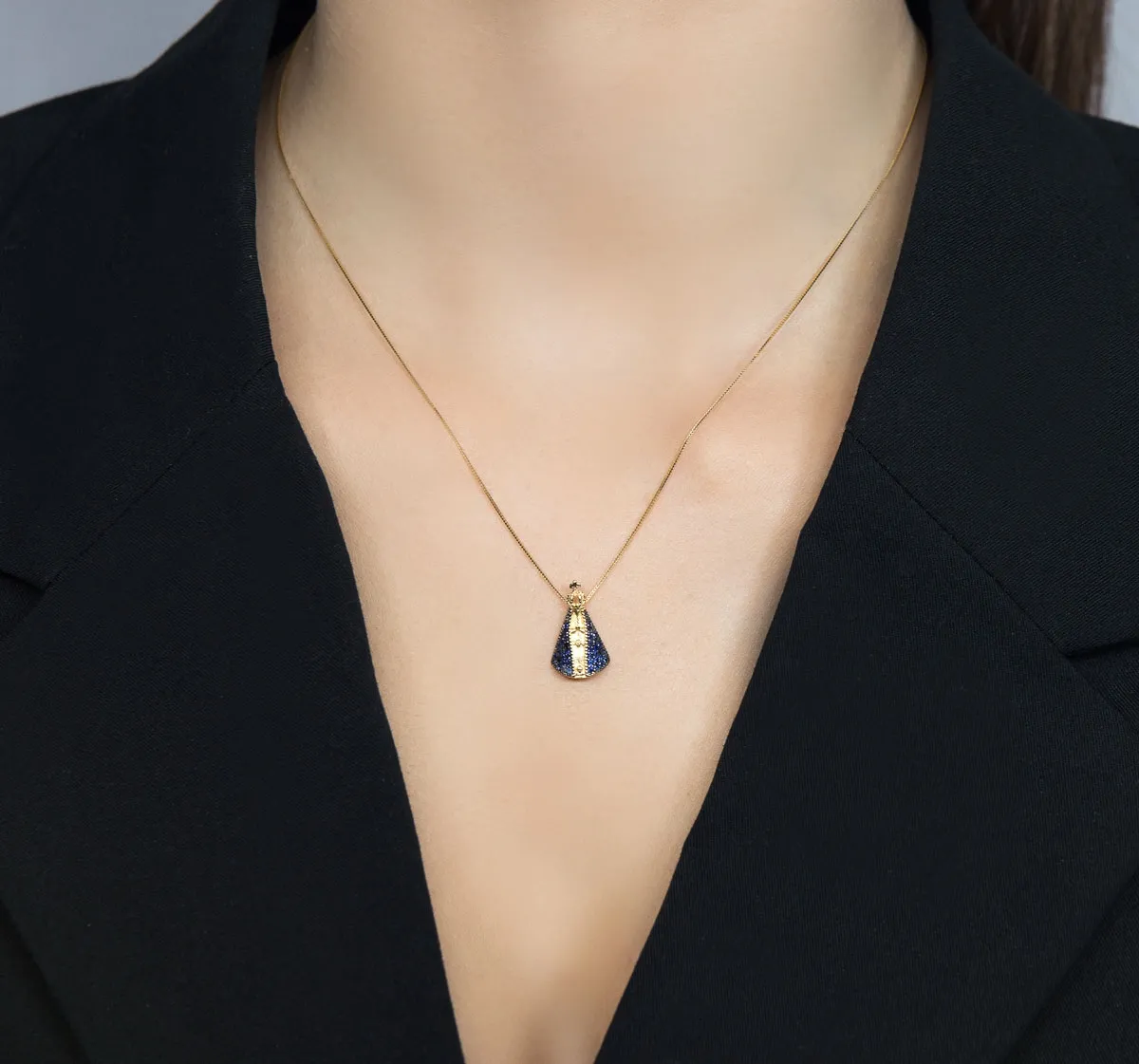 Pingente de Ouro 18k N.S.Aparecida com 40pts de safira azul