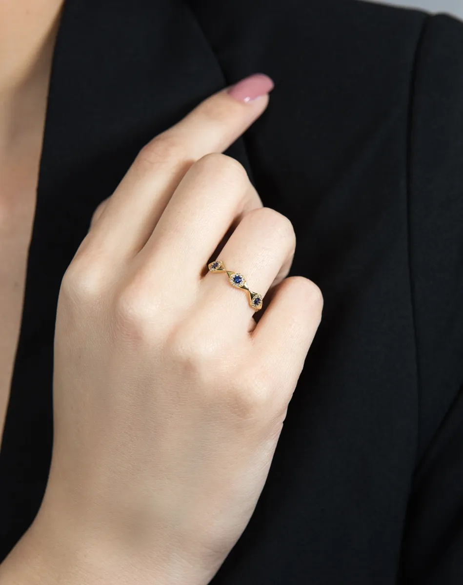 Anel de Ouro 18k olho grego com 12pts de diamantes e safira azul