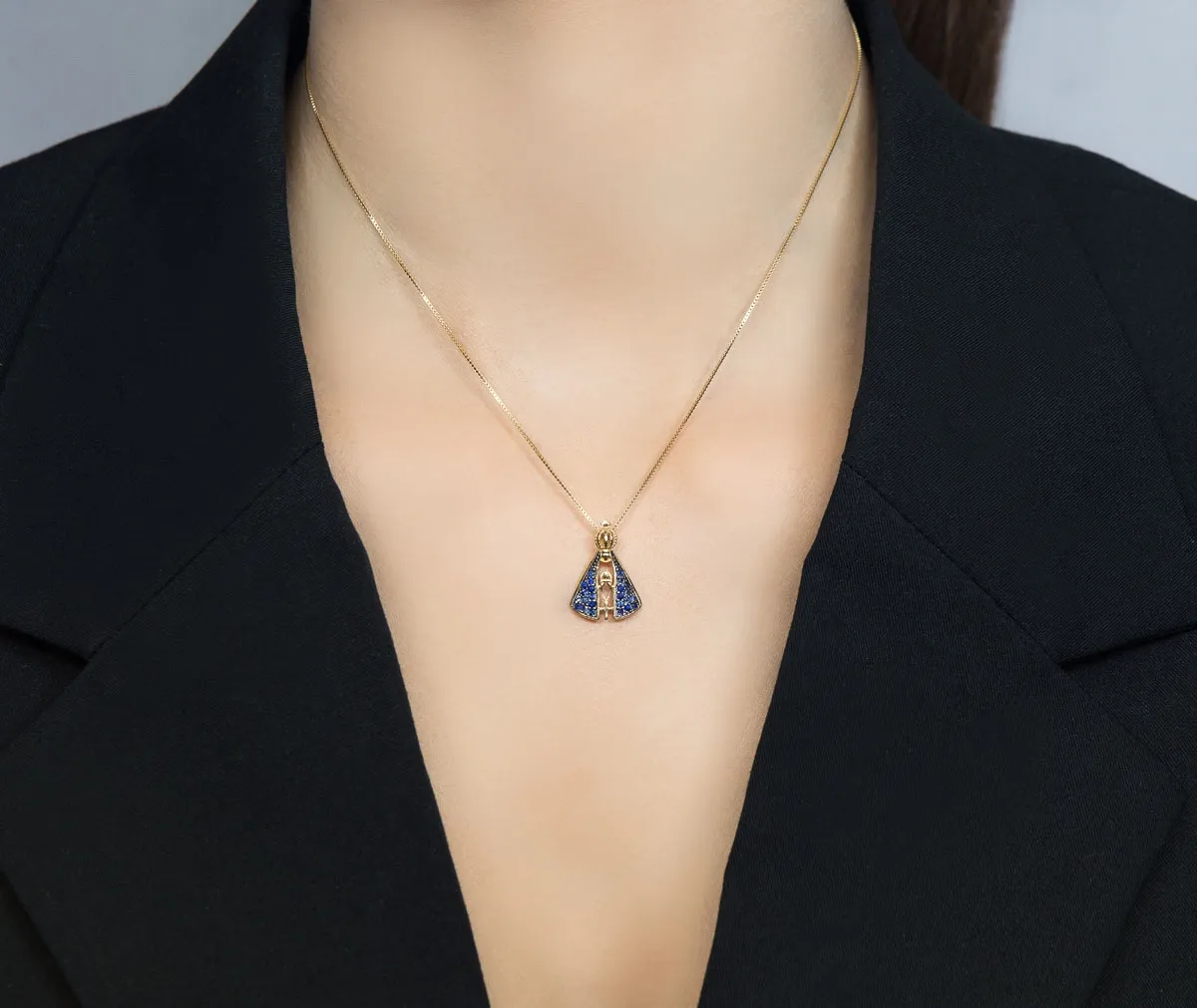 Pingente de Ouro 18k N.S. Aparecida com 24 pds de safira azul