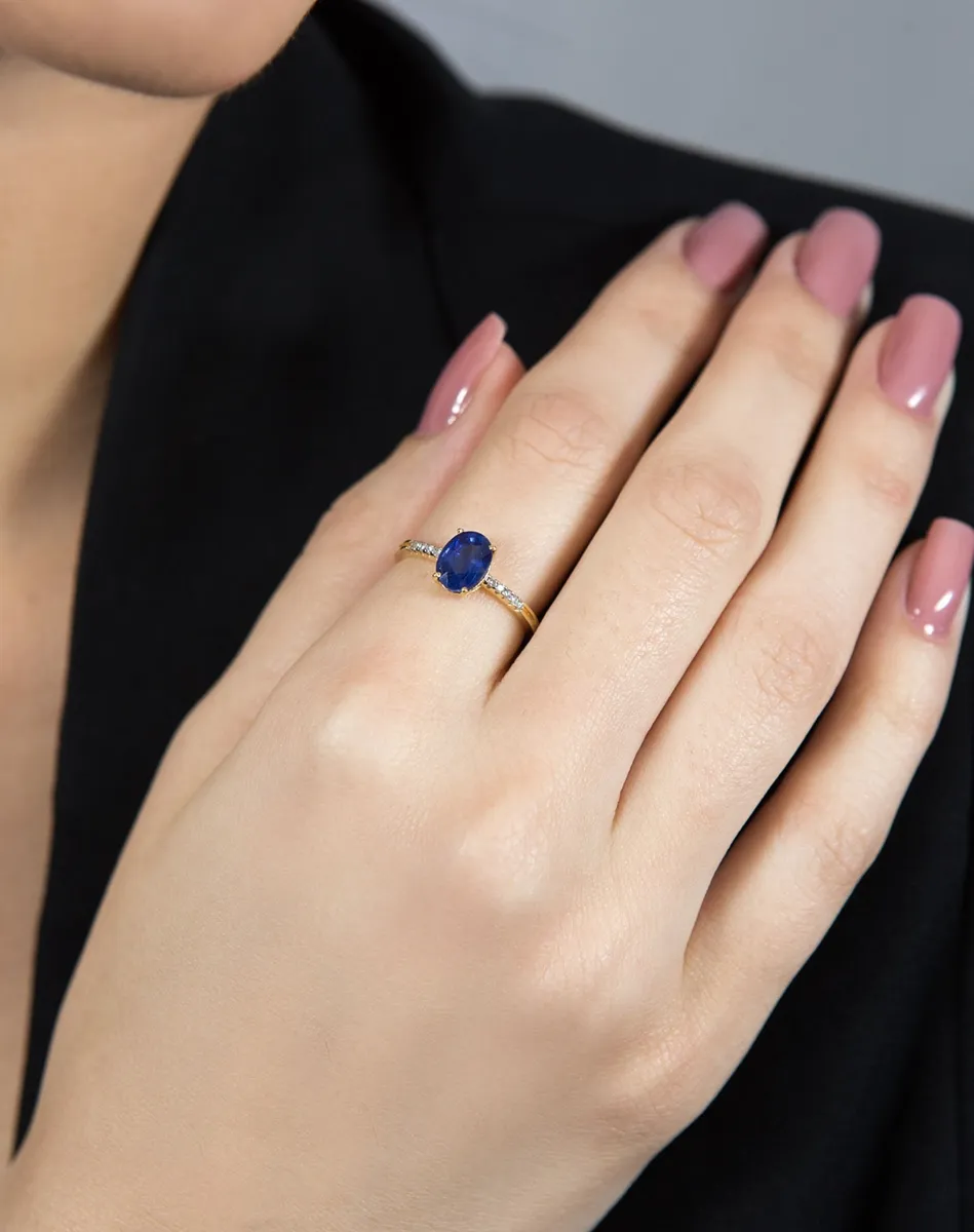 Anel de Ouro 18k gota oval de safira azul com 7pts de diamantes