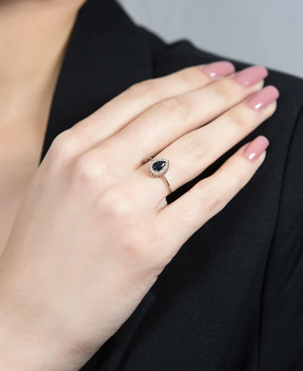 Anel de Ouro branco 18k com gota de safira azul e 9,5pts de diamantes