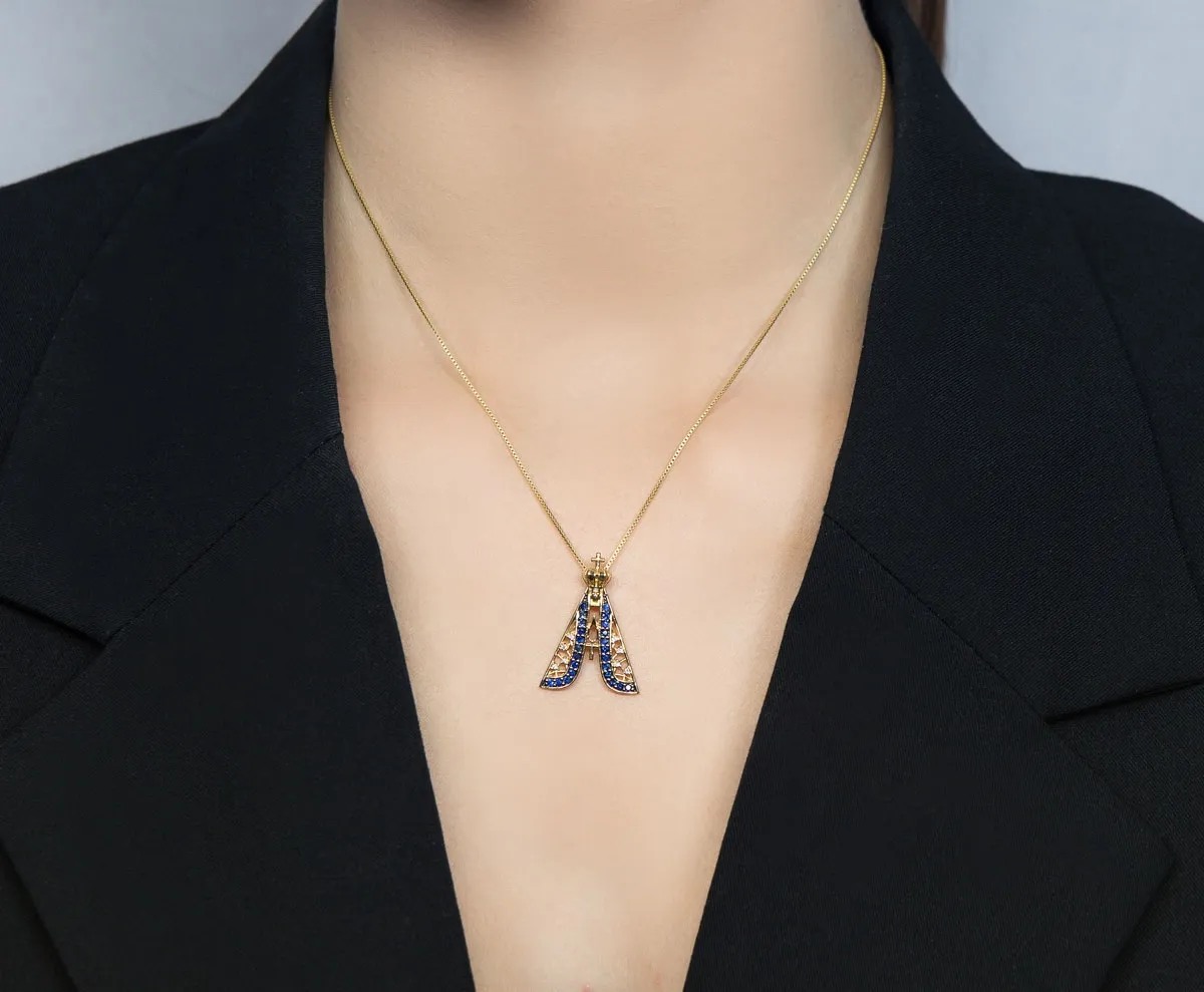 Pingente de Ouro 18k N.S. Aparecida com 4pts de diamantes e safiras azuis
