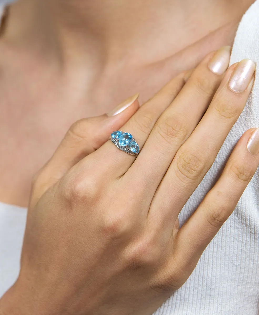 Anel de Ouro branco 18k com gotas de Topázios e 18pts de Diamantes