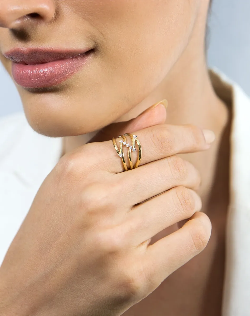 Anel de Ouro 18k vazado aros polidos interligados com 10,5pts de diamantes