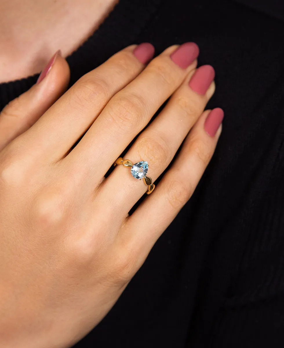 Anel ouro amarelo 18k aro gotas polidas e gota de Topázio Sky