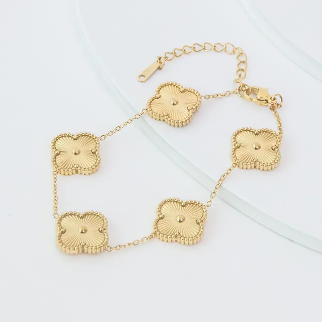 Pulseira Dourada Trevo 3D com Bolinhas em Aço Inoxidável