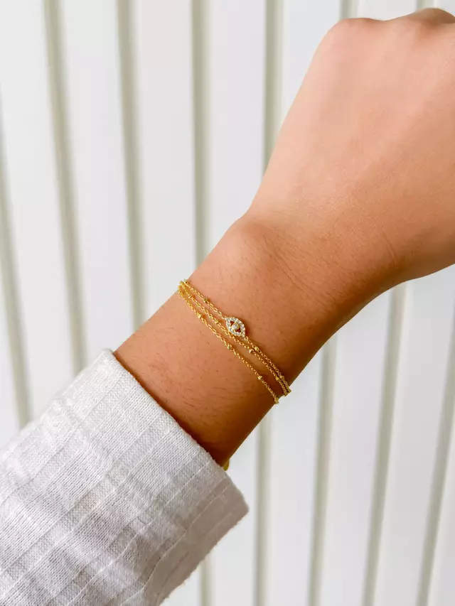 Pulseira Tripla Olho Grego Cristal - Dourada
